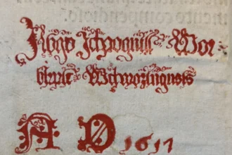 A beautiful shade of red. And color matters. The green color requires wearing gloves. How do you work with an old book?