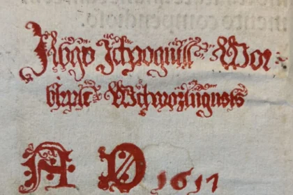 A beautiful shade of red. And color matters. The green color requires wearing gloves. How do you work with an old book?