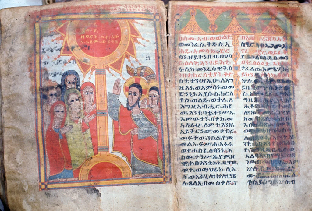 The beginning of the Easter homily, featuring a depiction of the Noli me tangere – a cloud on which Adam and other souls, freed by Christ from the abyss, are journeying to Paradise. The manuscript dates from the 14th or 15th century.