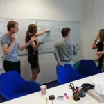 Researchers at HILL – Human Interactivity and Language Lab analyzing in-depth interviews, ethnographic studies, 2020