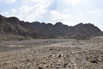 View of the Polish excavation site. The darker surface – where people are standing – is slag.